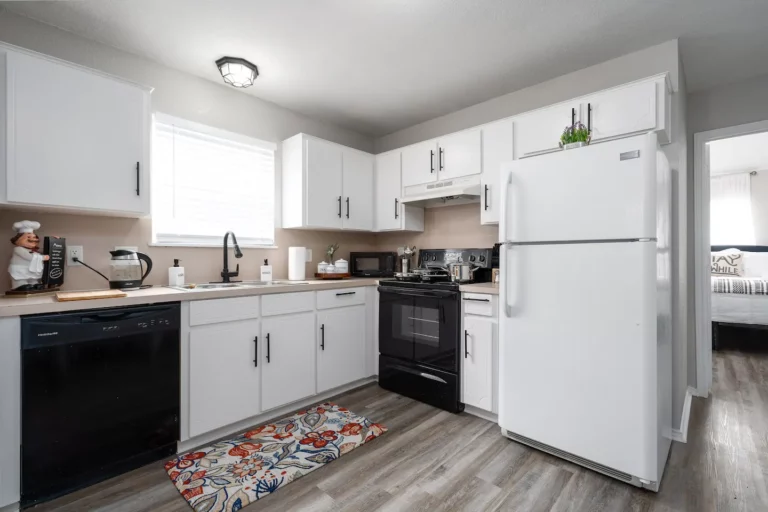 The kitchen has it all modern cooking appliances and spacious countertops!