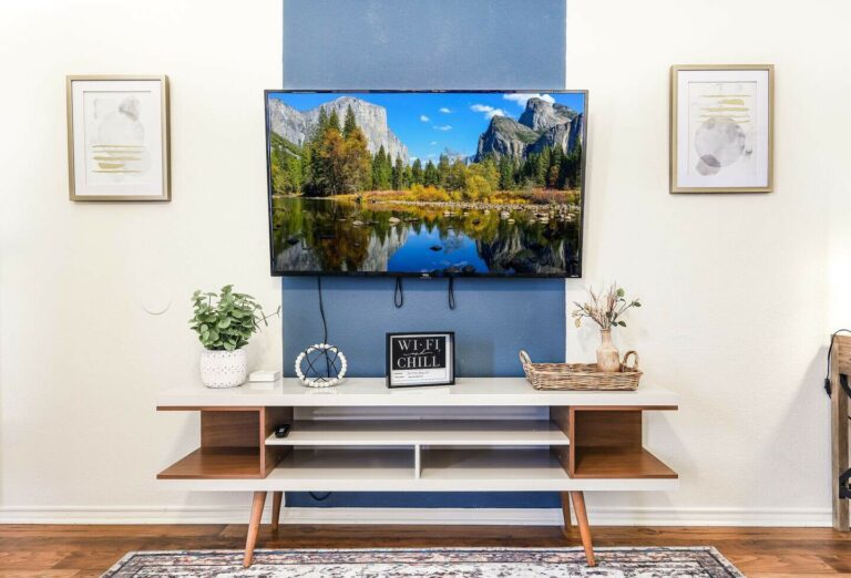 living room cabinet, wall decoration, and LED TV